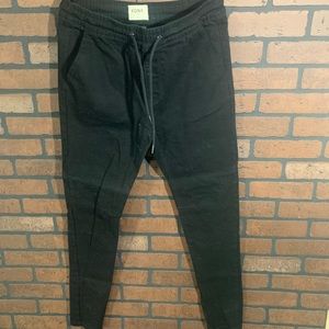 Mens KDNK black pants with elastic waistband. Size medium